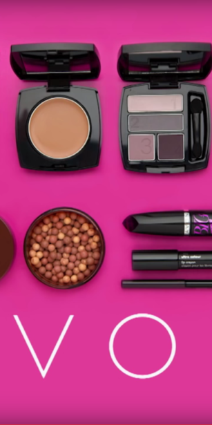 Pink background with Avon branded makeup products