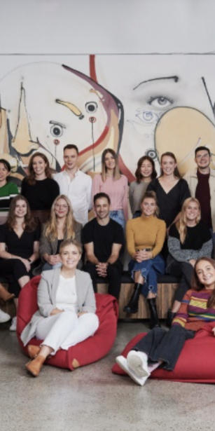 Sling & stone 70 employees group photo