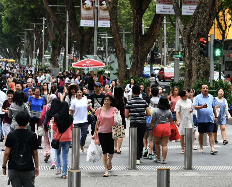 Lots of people walking on Orchard road