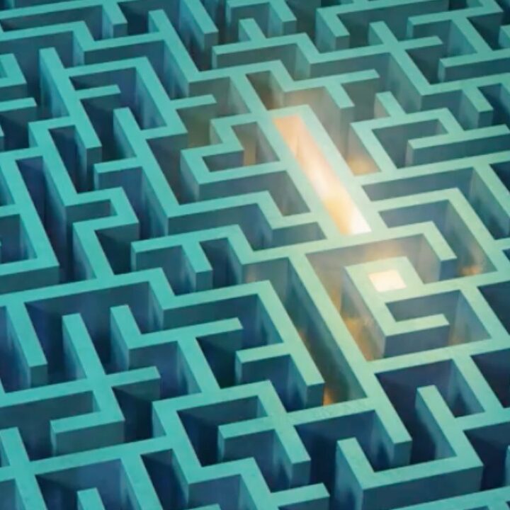 teal coloured maze with light in the center