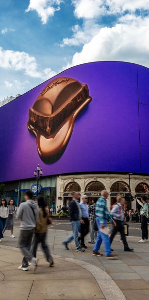 A melting piece of Cadbury Dairy Milk chocolate displayed on the Piccadilly Lights screen in London, as part of Cadbury's global campaign.