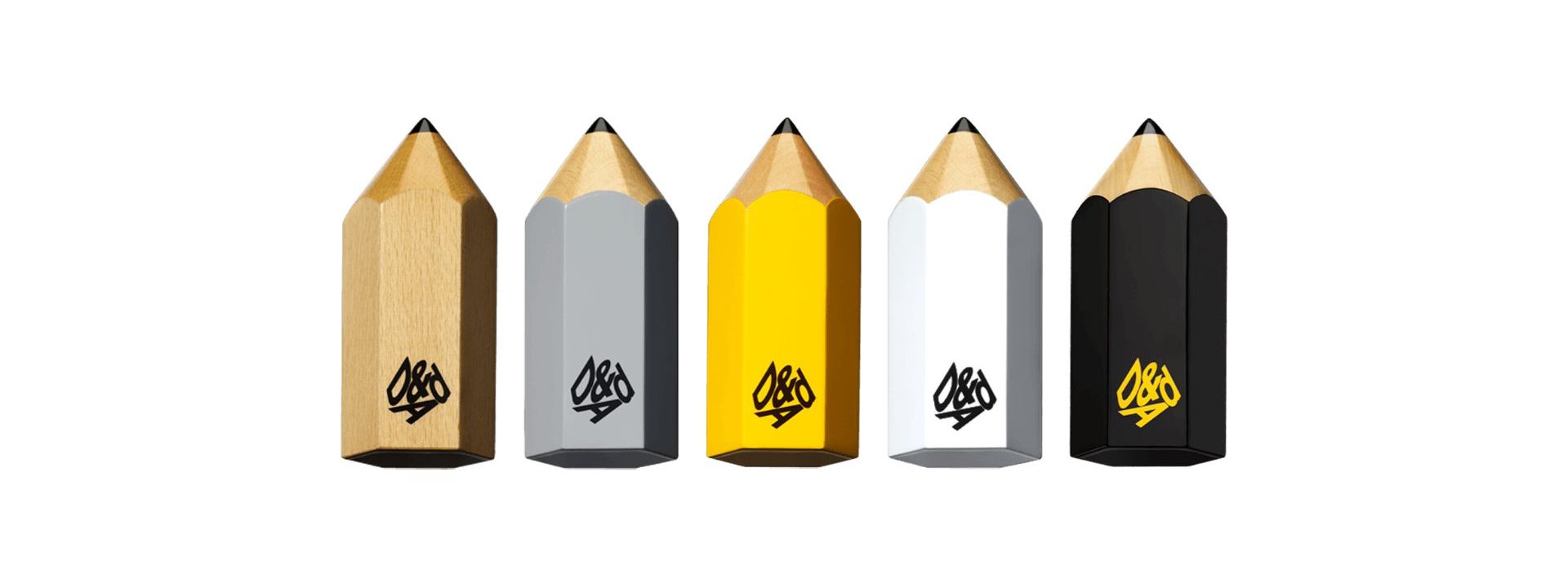 Five D&AD award pencils in a row, showcasing Wood, Graphite, Yellow, White, and Black Pencil designs.