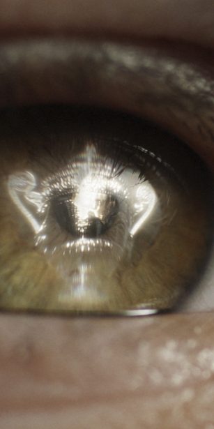Close up of eye with reflection of the Wimbledon Tennis trophy