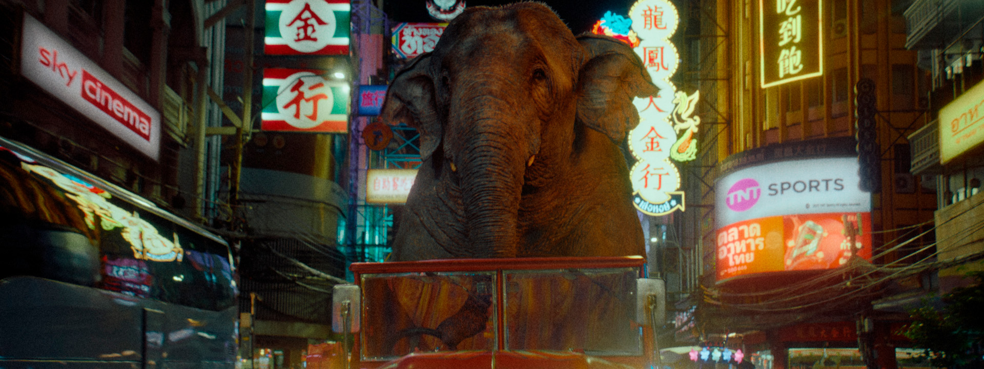 Elephant riding in vehicle - 'Trunk Trucker' O2 Ad