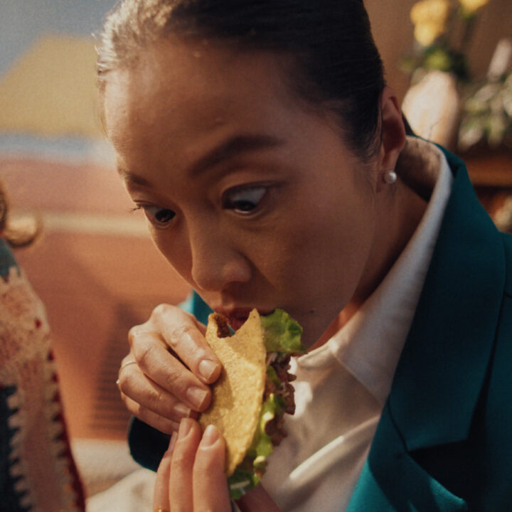 Woman eating a taco for an Ad campaign for Old El Paso