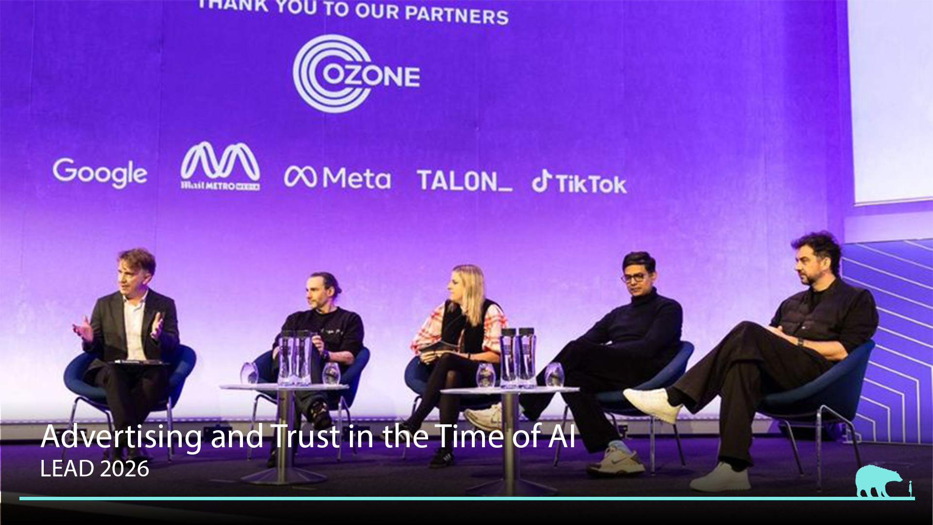 Alex Dalman and industry experts participating in a panel event under a purple backdrop with sponsor logos at LEAD 2026 conference.
