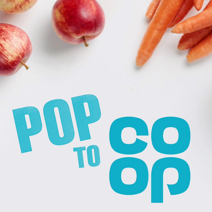 Co-op grocery campaign ad banner with blue Pop to Co-op logo surrounded by fresh produce and bakery items.