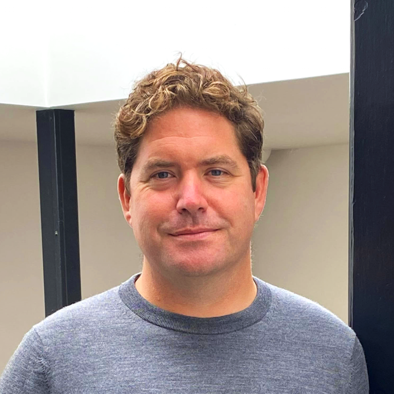 Rob Sellers standing in a stairwell of VCCP HQ.